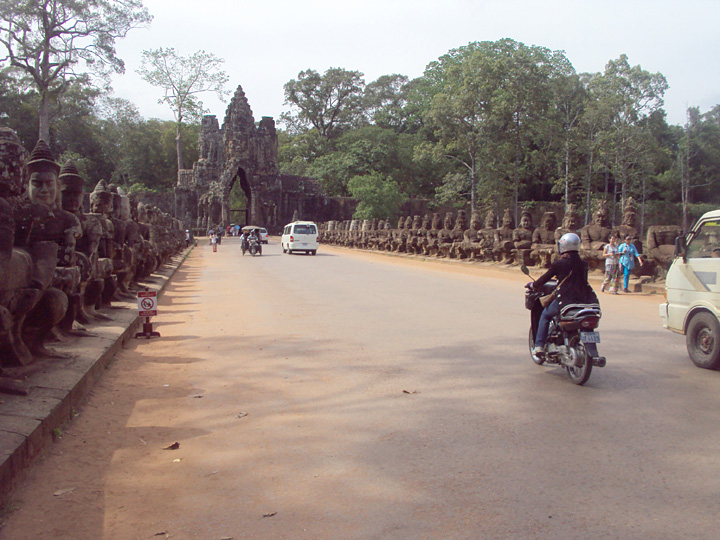 The bridge to the south gate of Angkor Thom.